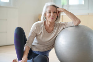 senior woman with yoga ball